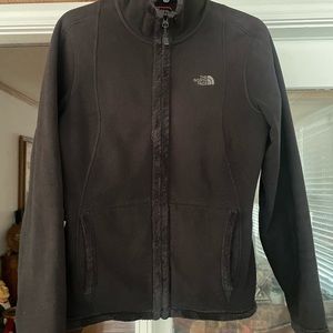 NorthFace fuzzy zip up jacket.